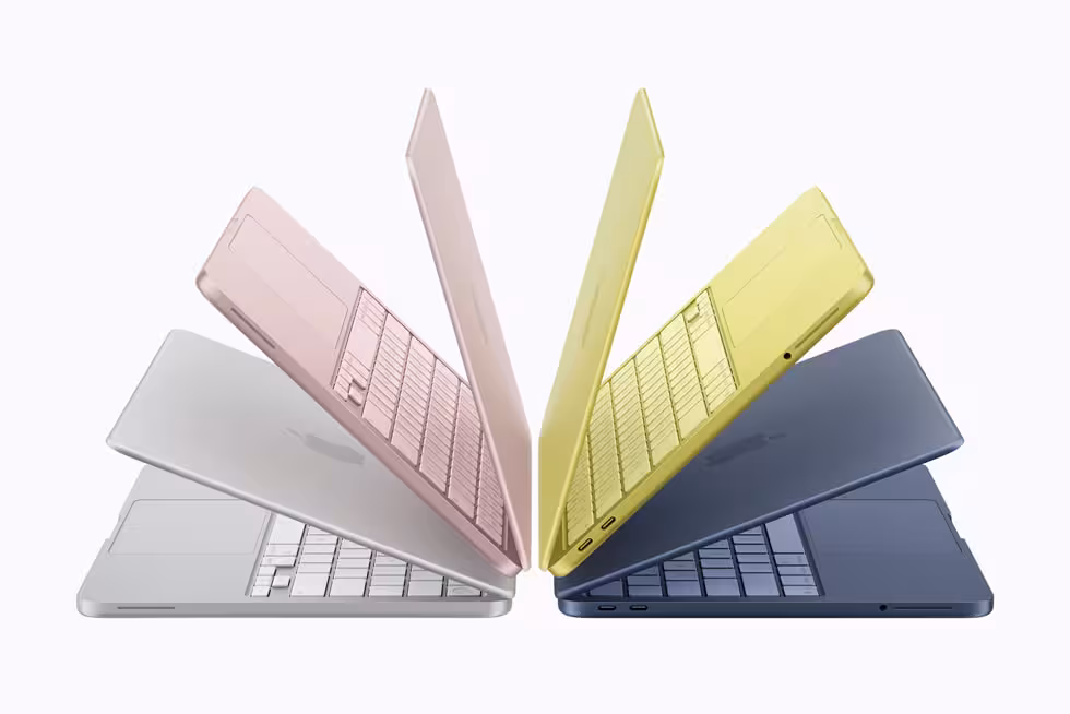 Apple MacBook Neo shown in blush, indigo, silver and citrus